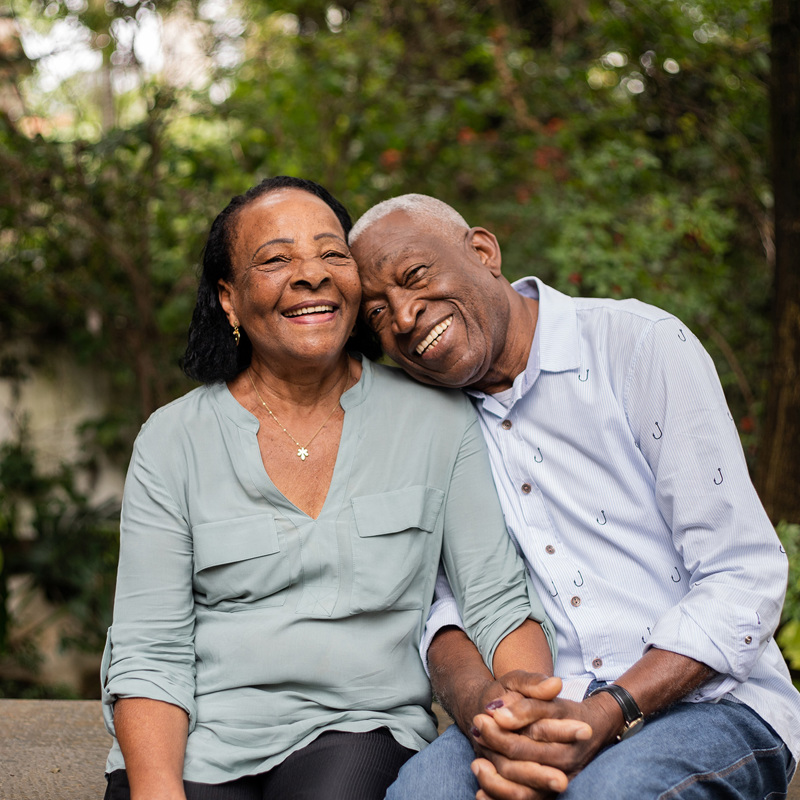 Older couple holding hands