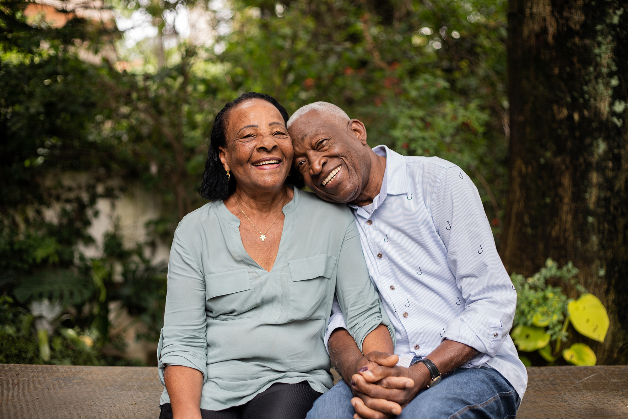 Older couple holding hands